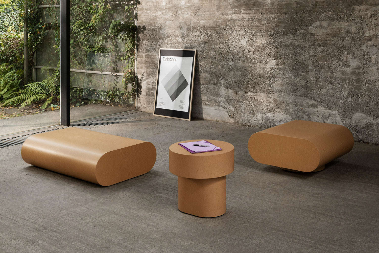 An image featuring the Stump Tables in the variants Stump Coffee Table Medium Natural, Stump Side Table Natural, and Stump Coffee Table Large Natural.